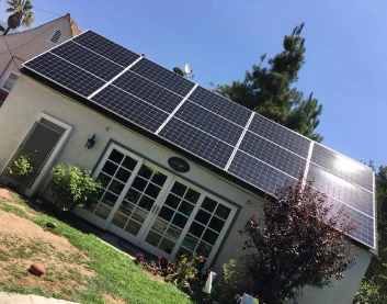 Solar panels on the roof of a detached backyard studio